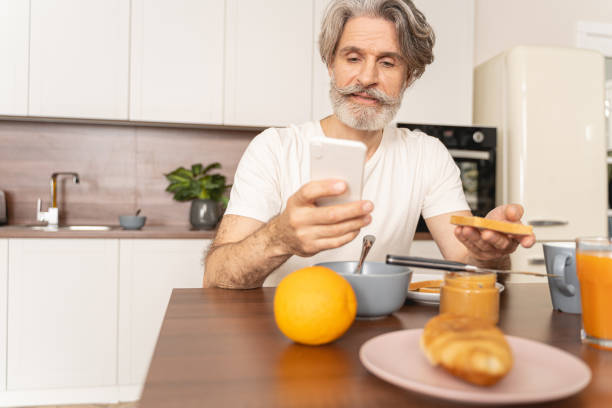 Man surfing the internet on his cellphone
