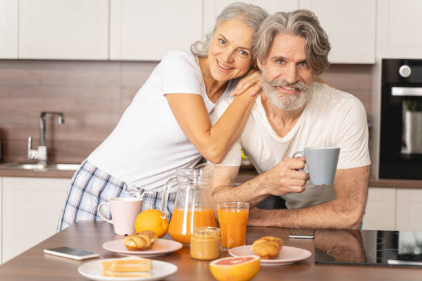 istock Good-looking woman leaning on her husbands shoulder 1193752842