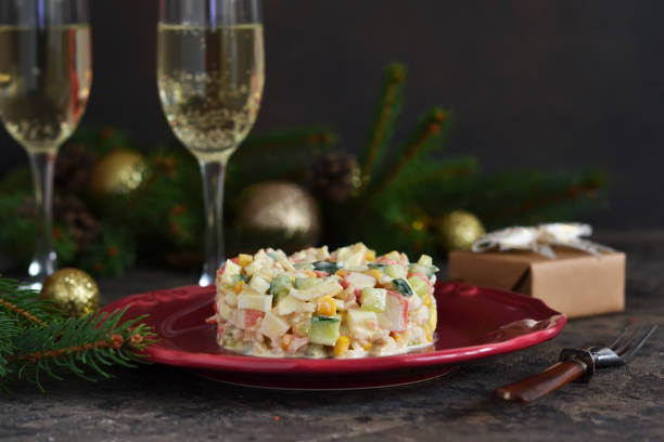 istock New Year's holiday salad with crab and corn on the table. Horizontal focus. 1193754104