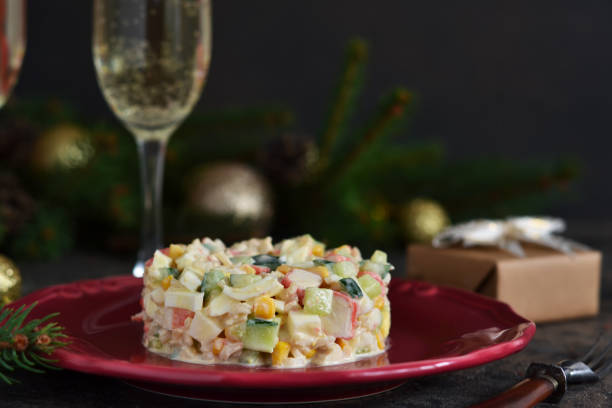 istock New Year's holiday salad with crab and corn on the table. Horizontal focus. 1193754130