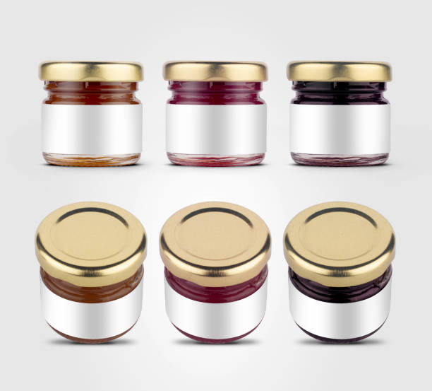 small jam jars with blank labels stock photo