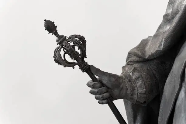 Photo of classical statue with hand holding a scepter