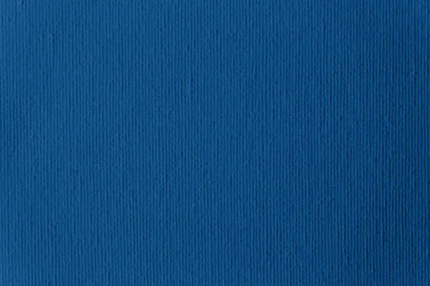 Photo of Blue Classic Primed Artist's Canvas Fabric Background Trendy Color of Year 2020 Close-Up Texture Grid Pattern Macro Photography