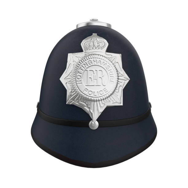British Police Bobby Helmet Hat Isolated British Police Bobby Helmet Hat isolated on white background. 3D render metropolitan police stock pictures, royalty-free photos & images