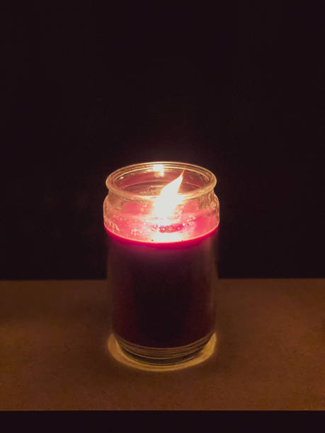 istock Candle lights the darkness 1193758241