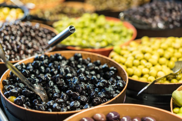 Fresh and cured olives are for sale in bulk, self-service
