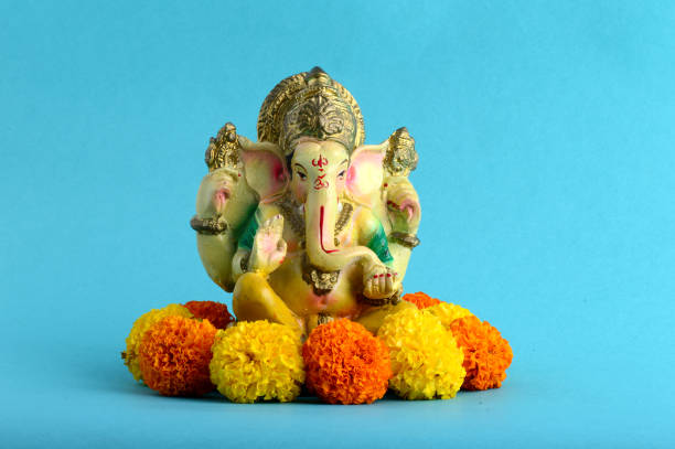 istock Hindu God Ganesha. Ganesha Idol on Blue Background 1193761885
