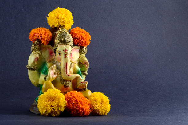 istock Hindu God Ganesha. Ganesha Idol on grey Background. 1193762289