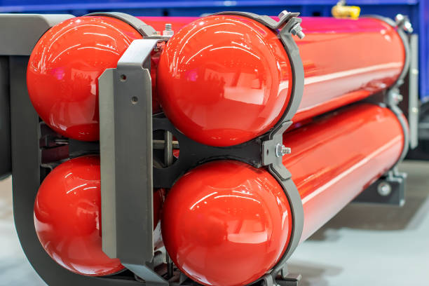 gas equipment for propane red gas cylinders on a car stock photo