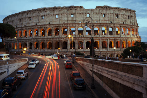 istock Illuminated Coliseum at dusk, Rome, Italy. 1193768376