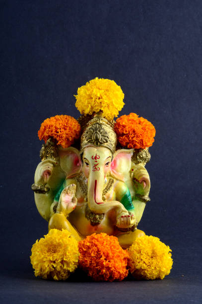 istock Hindu God Ganesha. Ganesha Idol on grey Background. 1193769085