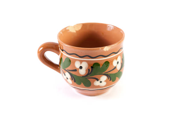 istock Ceramic cup in ethnic style on white background 1193770173