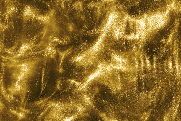 istock gold glitter shimmering magic bokeh background 1193771526