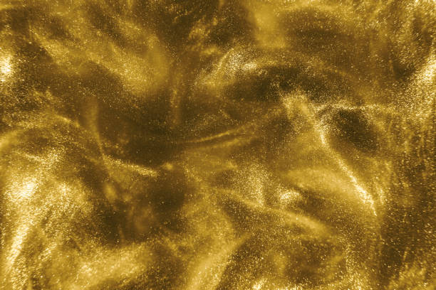 istock gold glitter shimmering magic bokeh background 1193771552