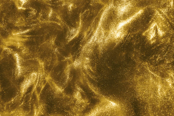 istock gold glitter shimmering magic bokeh background 1193771554