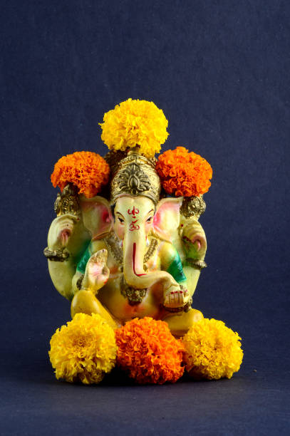 istock Hindu God Ganesha. Ganesha Idol on grey Background. 1193772941