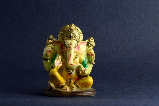 istock Hindu God Ganesha. Ganesha Idol on grey Background. 1193773780