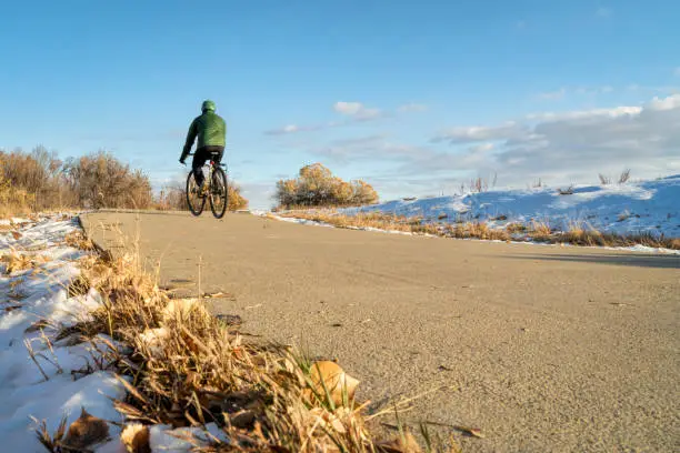 Winter or late fall commuting on a bike trail - Poudre River Trail in northern Colorado