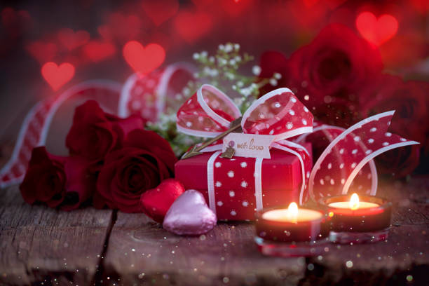 istock Valentine's Day Gift with Red Roses, Chocolate Candy and Candlelight 1193775882