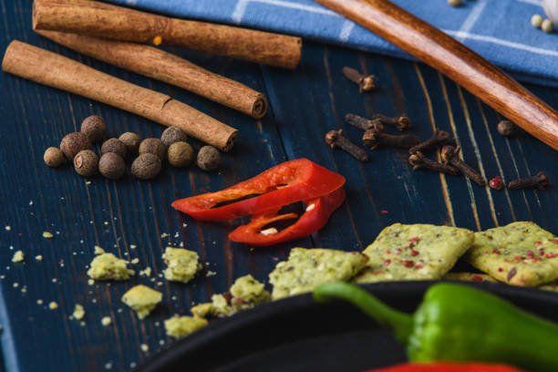 Spice garlic pepper wooden spoon and blue table