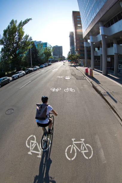 istock Bicycle Messenger Rides Bike Lane 1193782264