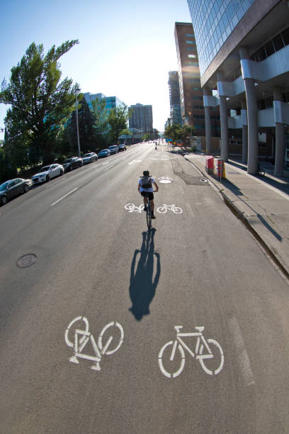 istock Bicycle Messenger Rides Bike Lane 1193782298