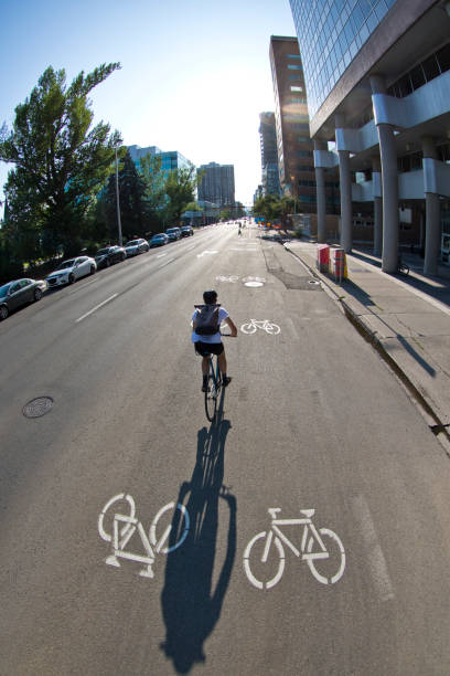 istock Bicycle Messenger Rides Bike Lane 1193782488