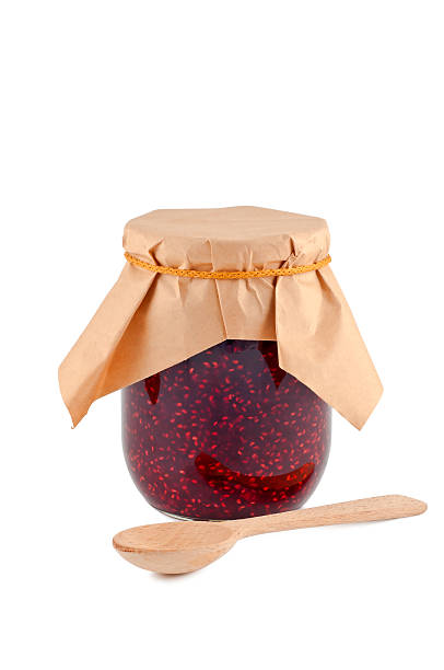 istock Jam in glass jar isolated on white background 119378357