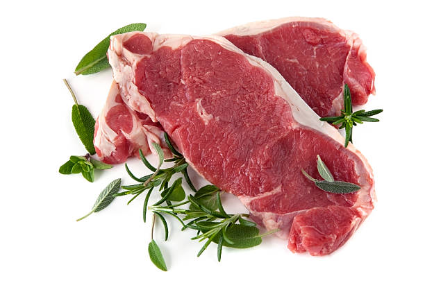 Raw Steaks with Herbs  porterhouse steak stock pictures, royalty-free photos & images
