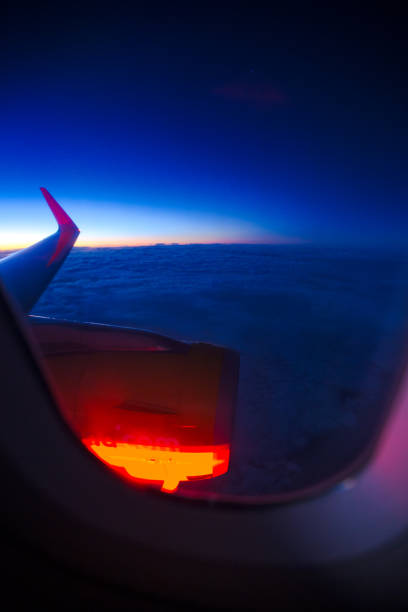 istock view of the sunset on cloud through the airplane window 1193789181