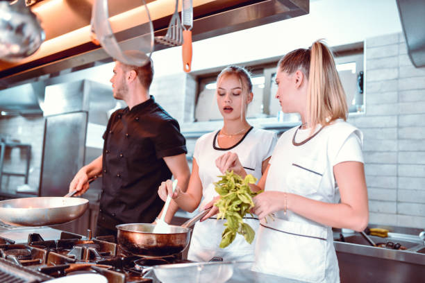 istock Females Learning About Spices From Male Chef 1193789436