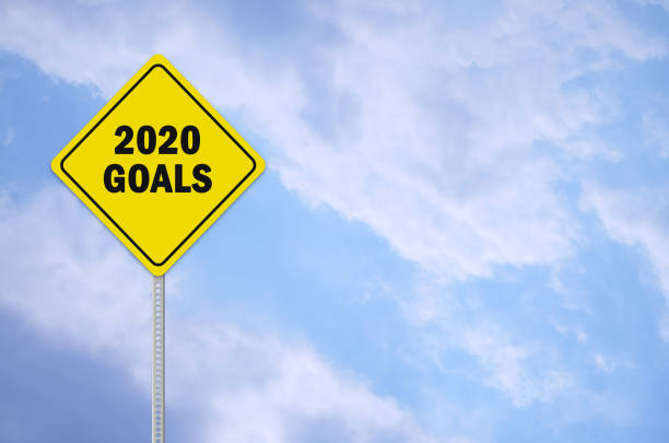 2020 goals written on traffic sign stock photo