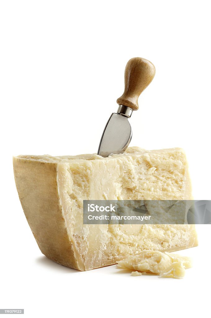 parmesan cheese with knife Parmesan Cheese Stock Photo