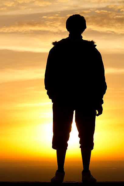 istock Sunrise  silhouette   person   man 119379124