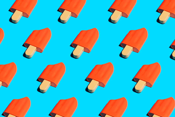 istock Colorful ice cream popsicle pattern on bright blue background. 1193791355