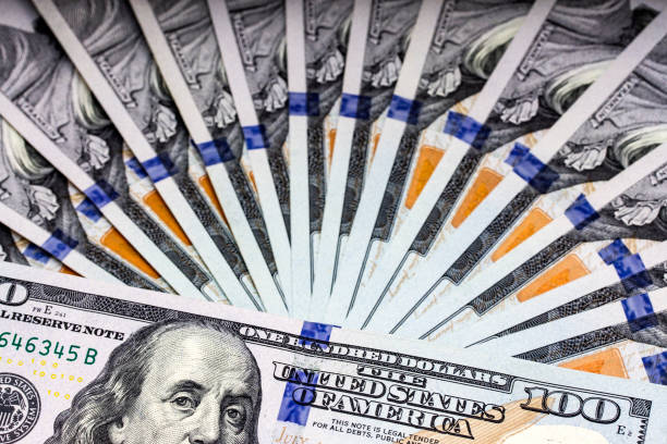 istock Fan of 100 US Dollars Banknotes 1193793479