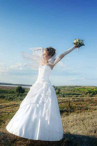 istock happy bride outdoors in the morning 119379360