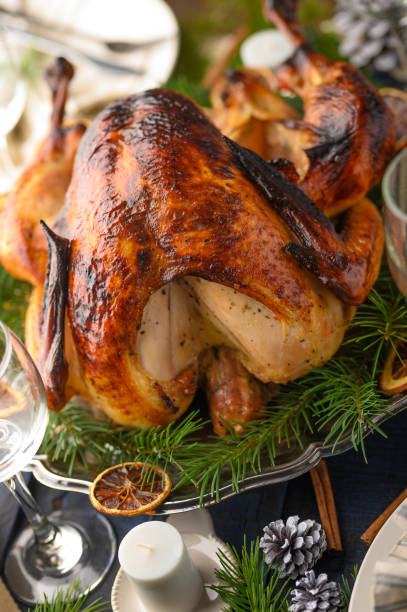 istock Turkey on the festive table, served table, Holidays recipes. Vertical photo 1193794740