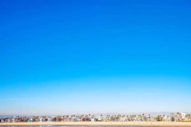 Wide angle image of a Southern California beach on a sunny warm day.