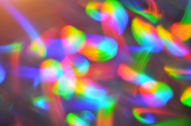 luci disco sfocate multicolore - spectrum lighting equipment glamour defocused foto e immagini stock