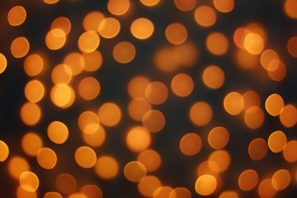 istock Abstract blur golden bokeh light Christmas holiday background 1193802404
