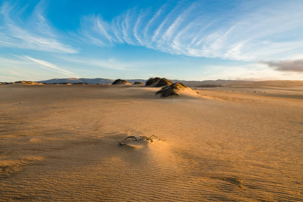 Sand Dunes sunset, beautiful cloudy sky background
