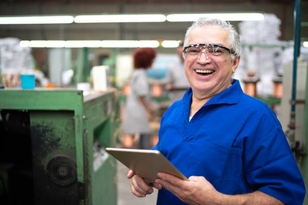 istock Portrait of an engineer using digital tablet in a factory 1193808782