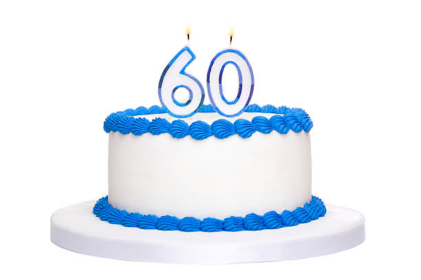 istock Freshly made birthday cake and number 60 candles 119381546