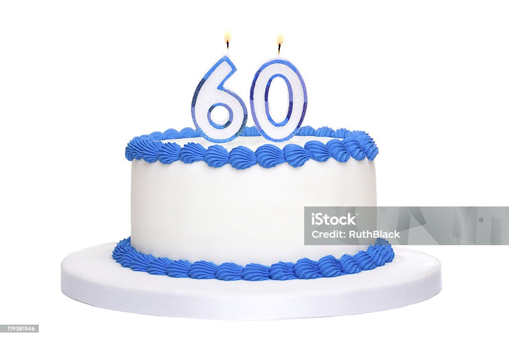 Freshly made birthday cake and number 60 candles Birthday cake decorated with blue frosting and number sixy candles Number 60 Stock Photo