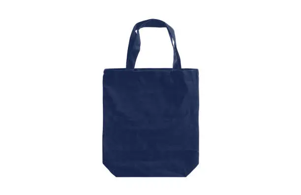 Photo of Dark blue cloth bag isolated on a white background