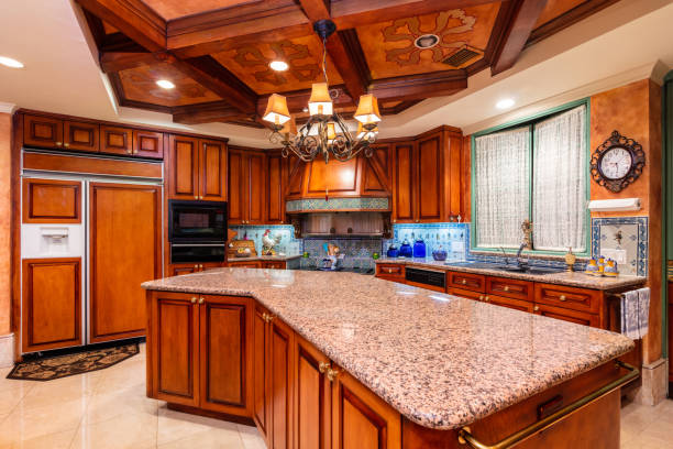 Luxury Kitchen Design Beautiful luxury home kitchen with red cherry wood cabinets. domestic kitchen cabinet elegance showcase interior stock pictures, royalty-free photos & images