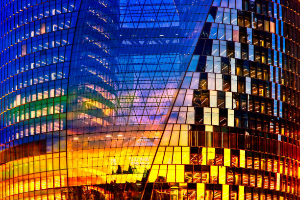istock Sunset glow mapped on architectural glass 1193825153