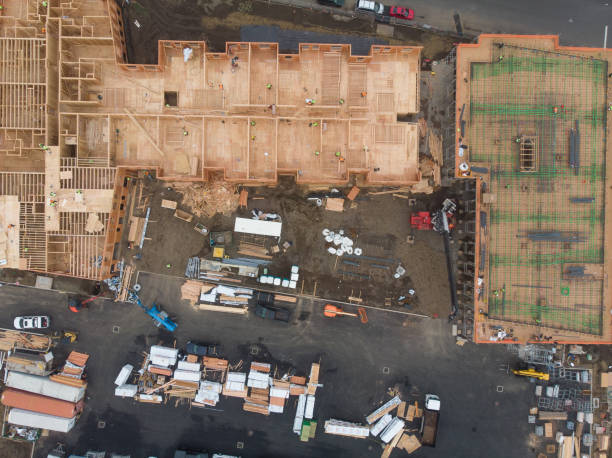 istock Texture. Construction of complexes with construction equipment and people. Top view. New house construction. 1193825157