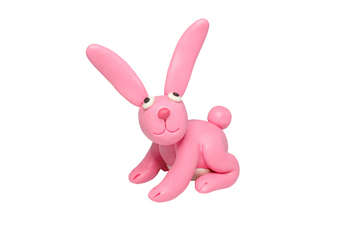 Statues like cute animals for children. Molding from plasticine. Cartoon characters, Rabbit isolated on white background with clipping path.